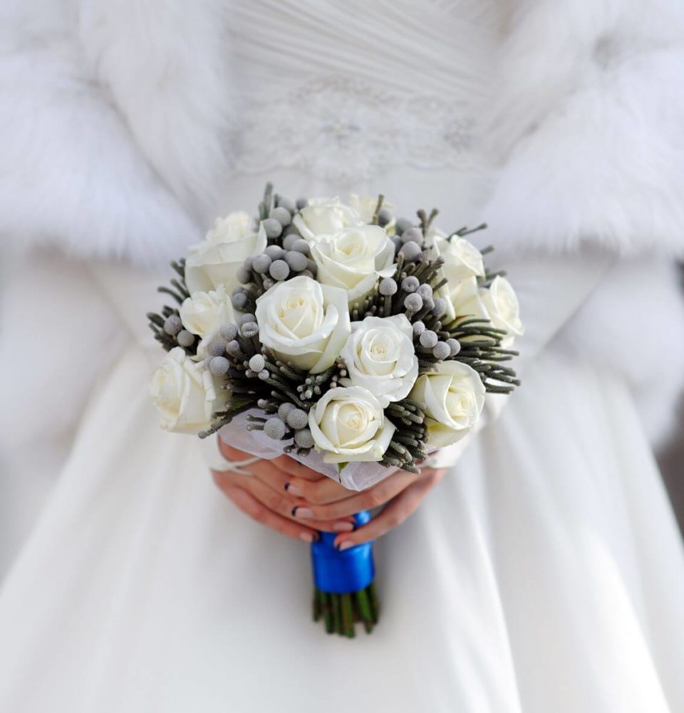 winter bride in dress and coat