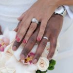 wedding rings on left hands