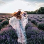 Ultimate Guide to Marrying in France 4 bride running through lavender fields in france