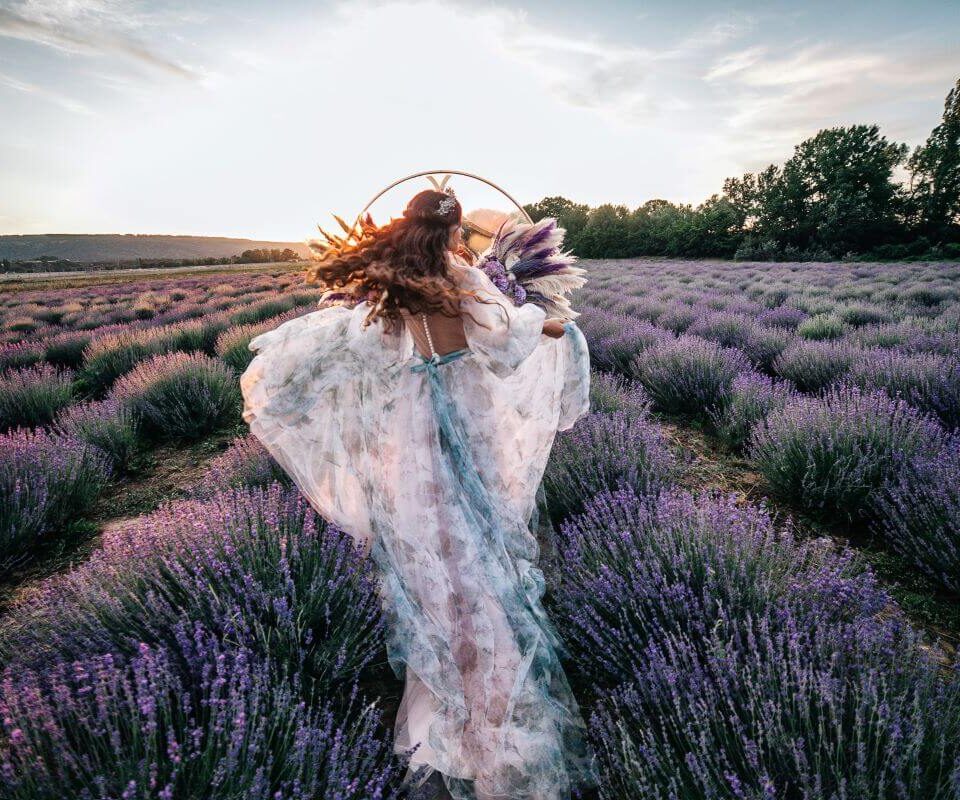 Ultimate Guide to Marrying in France 2 bride running through lavender fields in france