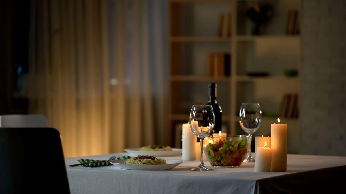 How to Stay in Love After the Wedding Day: 8 Meaningful Ways to Keep the Spark Alive 2 keep the romance alive with candel lit dinners at home