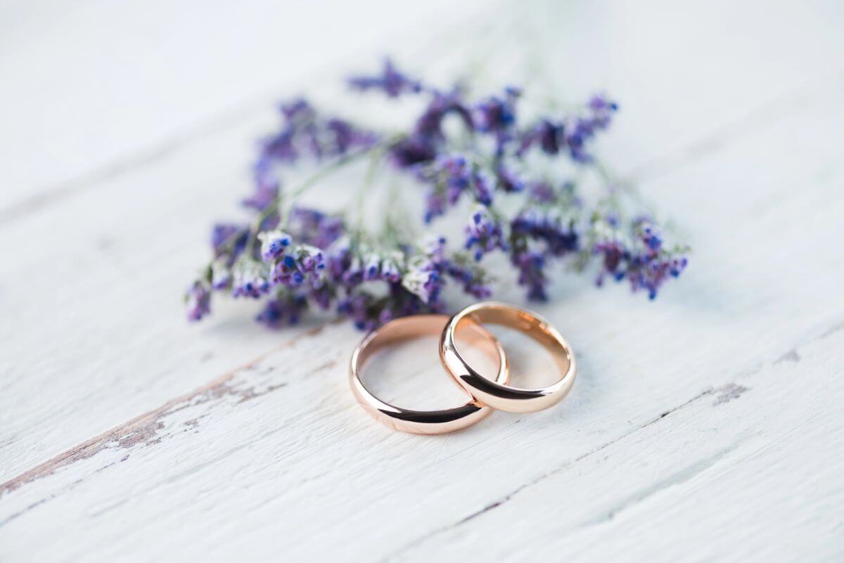 10 Things Not to Forget on Your Wedding Day 6 Close-up of two wedding rings on a wooden table, ready for the wedding ceremony