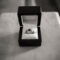 black zirconium wedding ring in box
